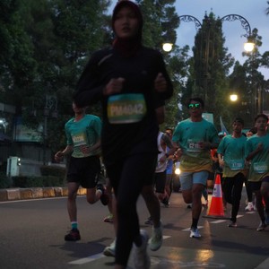 Race photo from BAUR RUN 2025