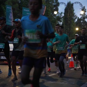 Race photo from BAUR RUN 2025