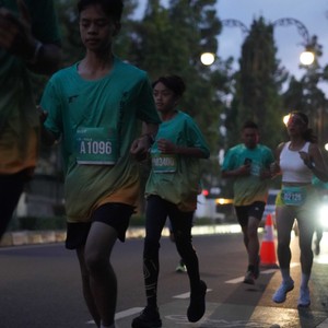 Race photo from BAUR RUN 2025