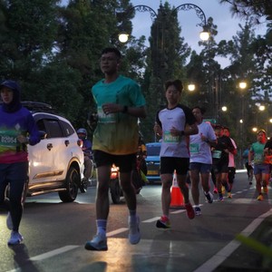 Race photo from BAUR RUN 2025