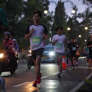 Race photo from BAUR RUN 2025