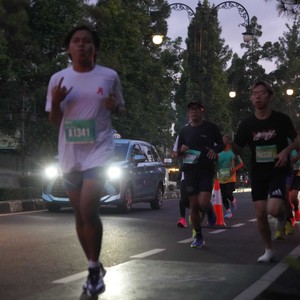 Race photo from BAUR RUN 2025
