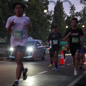 Race photo from BAUR RUN 2025
