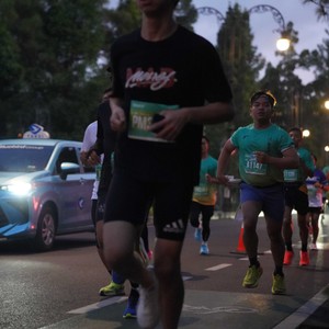 Race photo from BAUR RUN 2025