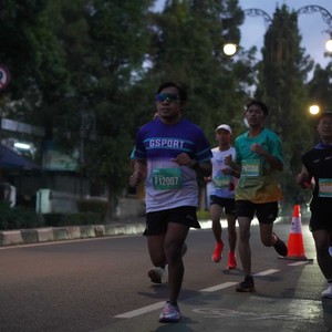 Race photo from BAUR RUN 2025