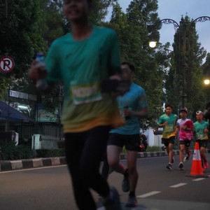 Race photo from BAUR RUN 2025