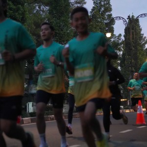Race photo from BAUR RUN 2025