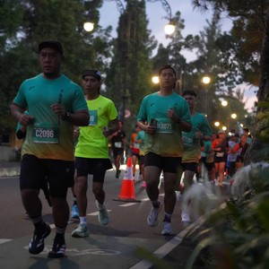 Race photo from BAUR RUN 2025