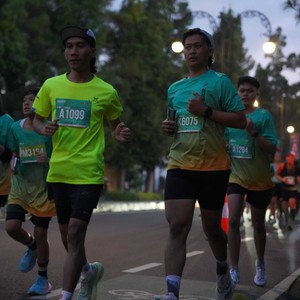 Race photo from BAUR RUN 2025