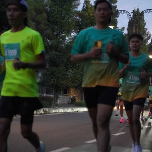 Race photo from BAUR RUN 2025