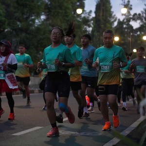 Race photo from BAUR RUN 2025
