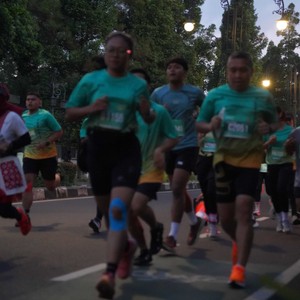 Race photo from BAUR RUN 2025