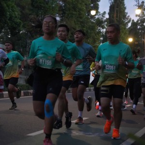 Race photo from BAUR RUN 2025