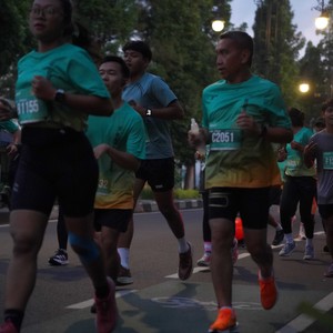 Race photo from BAUR RUN 2025