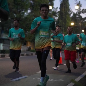 Race photo from BAUR RUN 2025