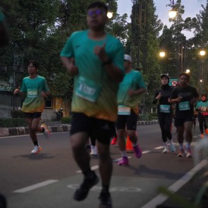 Race photo from BAUR RUN 2025