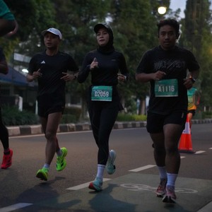 Race photo from BAUR RUN 2025