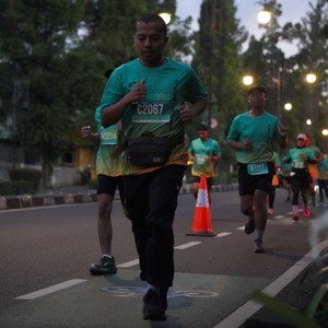 Race photo from BAUR RUN 2025