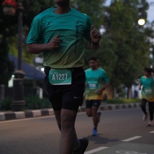 Race photo from BAUR RUN 2025