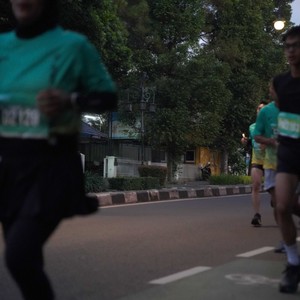 Race photo from BAUR RUN 2025