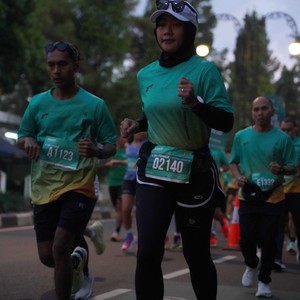 Race photo from BAUR RUN 2025