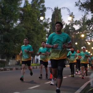 Race photo from BAUR RUN 2025