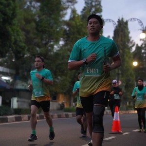 Race photo from BAUR RUN 2025