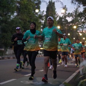 Race photo from BAUR RUN 2025