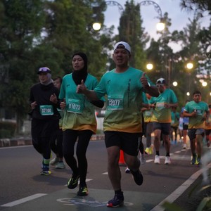 Race photo from BAUR RUN 2025