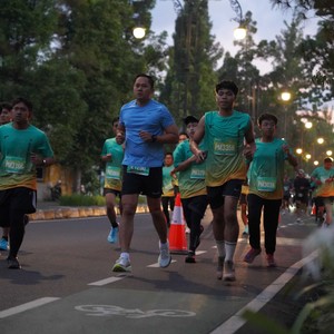 Race photo from BAUR RUN 2025