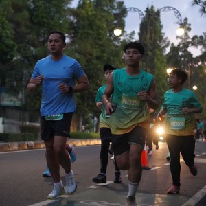 Race photo from BAUR RUN 2025