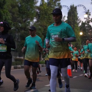 Race photo from BAUR RUN 2025