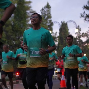 Race photo from BAUR RUN 2025