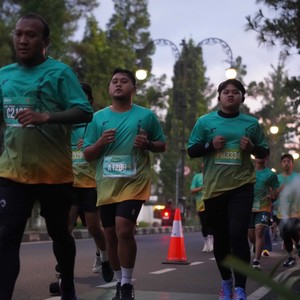 Race photo from BAUR RUN 2025