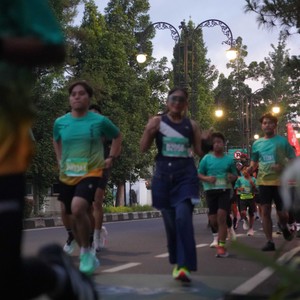Race photo from BAUR RUN 2025