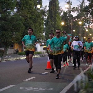 Race photo from BAUR RUN 2025