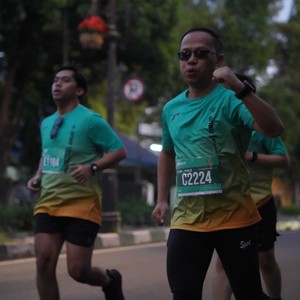 Race photo from BAUR RUN 2025