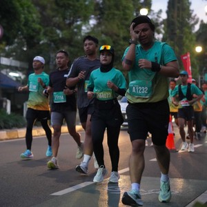 Race photo from BAUR RUN 2025