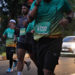 Race photo from BAUR RUN 2025