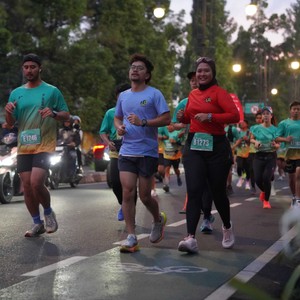 Race photo from BAUR RUN 2025