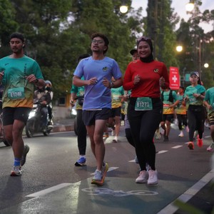 Race photo from BAUR RUN 2025