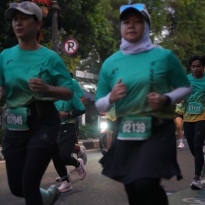 Race photo from BAUR RUN 2025