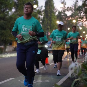 Race photo from BAUR RUN 2025