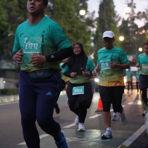 Race photo from BAUR RUN 2025