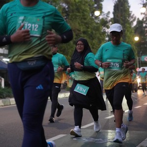 Race photo from BAUR RUN 2025