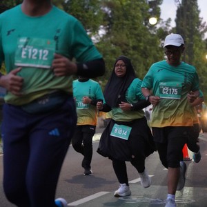 Race photo from BAUR RUN 2025