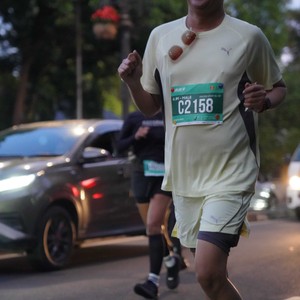 Race photo from BAUR RUN 2025
