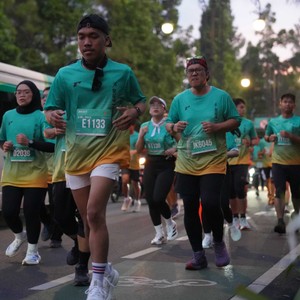 Race photo from BAUR RUN 2025