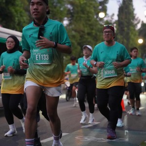 Race photo from BAUR RUN 2025