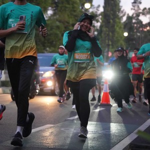 Race photo from BAUR RUN 2025